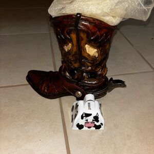 Brown boot decoration and cow bell